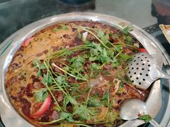 -周老三跷脚牛肉·全牛火锅(非遗传承店)