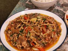 酸笋肉沫炒魔芋-浩海火燒雲傣家菜(芮欧百货店)