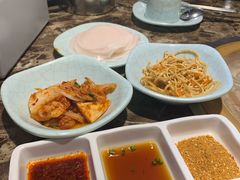 腌萝卜片-猪啊牛呀羊啊铜盘烤肉(正大广场店)