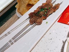 烤羊肉串-三人行骨头王火锅(长寿店)