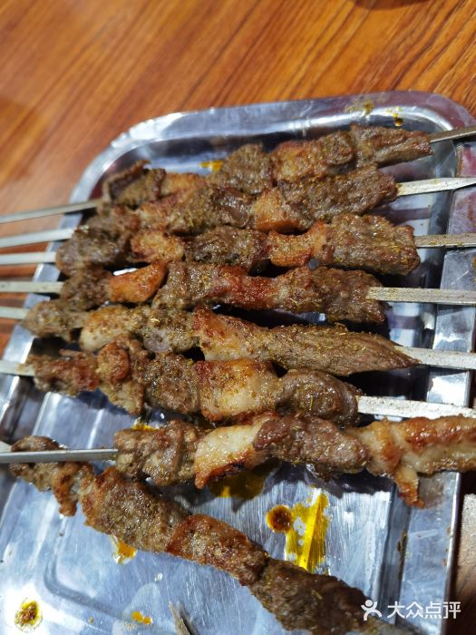 一杆旗抓饭图片