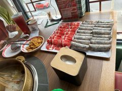 -明何记涮牛肚(品牌首店隋唐植物园南门古城路店)