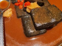 猴头菇鲍汁瑶柱扒制黑豆腐-肴约·花园式餐厅(湖里店)