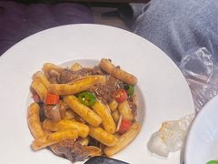 小仔排炒年糕-马灯部落·西湖边的创意山景餐厅(虎跑动物园店)