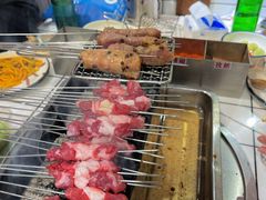 丹东黄牛肉-喜悦小串丹东小黄牛海鲜烧烤大排档(民主广场店)