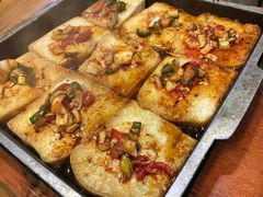 石板煎豆腐-草家酱蟹炭火烤肉店(珲春南路一店)