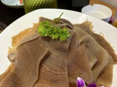 -明何记涮牛肚(品牌首店隋唐植物园南门古城路店)