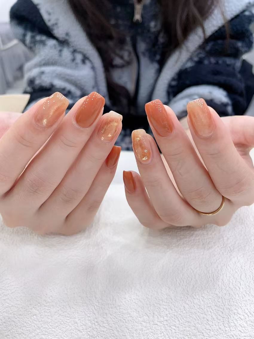 这种美甲以南瓜色,猫眼!