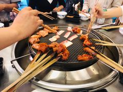 -彝人部落火盆烧烤(原内环足球场店)