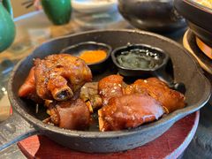 个旧烤猪蹄-云海肴·汽锅鸡·云南代表菜(天山百盛优客店)