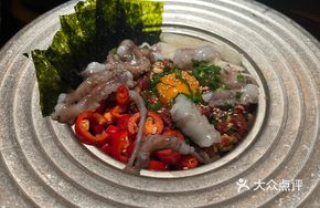 Raw Beef with Live Octopus
