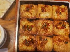 石板煎豆腐-草家酱蟹炭火烤肉店(珲春南路一店)
