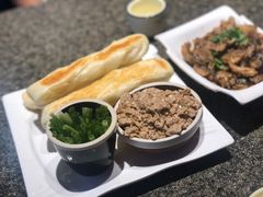虾酱卷子-渔民船说·北塘海鲜·天津菜·海肠捞饭(北塘古镇店)