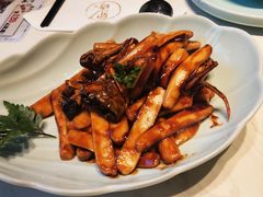 梭子蟹炒年糕-卯时·龙光雅宴·精致锡帮菜(惠山古镇店)
