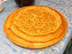 馕坑芝麻馕-巴扎美食·新疆菜·西域歌舞表演餐厅(新疆大厦店)