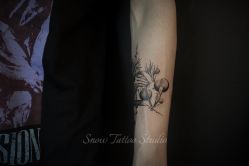 -SNOW TATTOO STUDIO