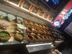 自助调料区-老牌坊云南鱼豆花火锅(哈西万达店)