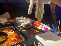 -老牌坊云南鱼豆花火锅(哈西万达店)