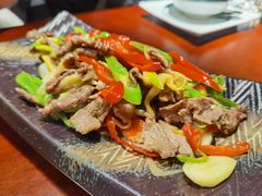 酸木瓜炒牛肉-紫滇源云南生态菜(丹凤街店)