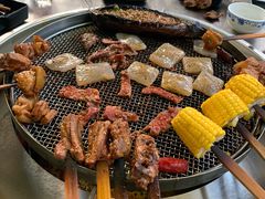 -彝人部落火盆烧烤(原内环足球场店)