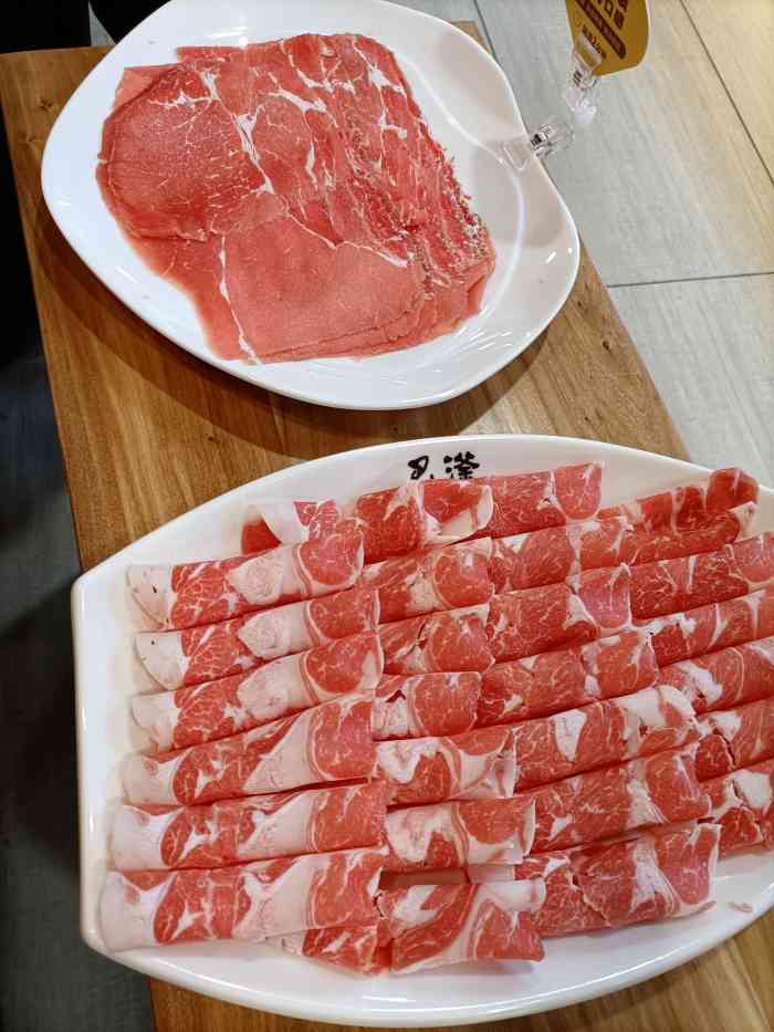 巴滏重庆火锅(庆丰店)-"[薄荷]环境:店面很大,座位之前间隔较.