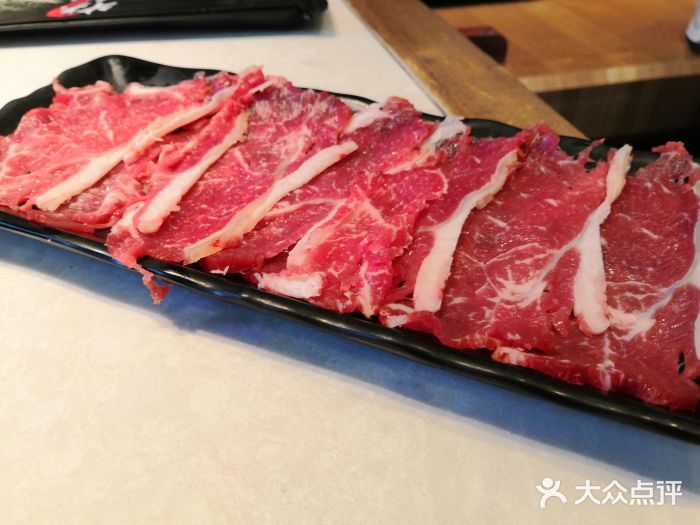 牛夫人·鲜切牛肉自助火锅(太平北路店)牛肉火锅吊龙图片