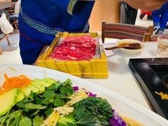 -老牌坊云南鱼豆花火锅(哈西万达店)