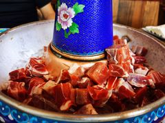 -毛辣果·贵州红酸汤牛肉火锅(西单店)