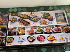 -曼听小寨海鲜烧烤·大连辣炒大王(盖州街店)
