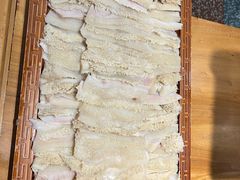 -明何记涮牛肚(品牌首店隋唐植物园南门古城路店)