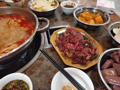-黄利砖万峰林布依特色酸笋牛肉馆