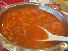 西红柿黄豆炖牛腩-大地春饼店(黄河路店)
