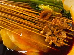 -拈签一笑黄牛肉辣卤串串
