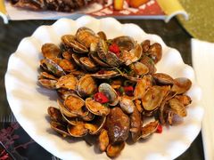 辣炒黑蚬子-皇朝海鲜酒店