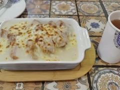 芝士薯仔猪扒焗饭-番茄屋葡式美食(总店)