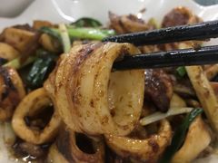 葱爆鱿鱼筒-明记海鲜大排档(巽寮湾店)