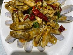 辣炒蚬子-添福来墨鱼饺子 · 海鲜东北菜(大连星海·黄浦路店)
