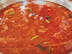 -黄利砖万峰林布依特色酸笋牛肉馆