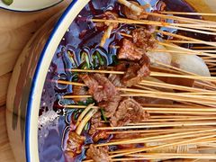 -拈签一笑黄牛肉辣卤串串