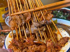 -拈签一笑黄牛肉辣卤串串