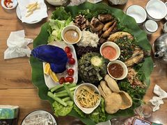 -沐毫傣泐云南菜孔雀宴•手抓饭傣味烧烤(曼听公园店)