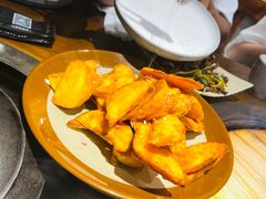 拔丝土豆-万里闯关东铁锅炖菜馆(吉林大路店)