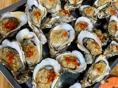 -蚝哥花姐湛江烤生蚝(美丽湾市场店)