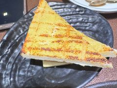 -曼听小寨海鲜烧烤·大连辣炒大王(盖州街店)