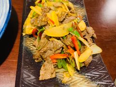 酸木瓜炒牛肉-紫滇源云南生态菜(丹凤街店)