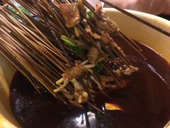 -拈签一笑黄牛肉辣卤串串