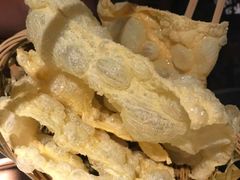 -老牌坊云南鱼豆花火锅(哈西万达店)