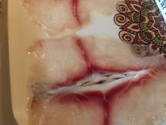 -老牌坊云南鱼豆花火锅(哈西万达店)
