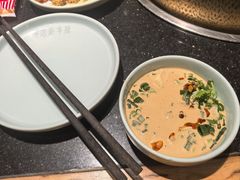-明何记涮牛肚(品牌首店隋唐植物园南门古城路店)