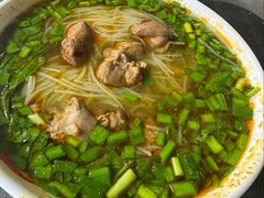 -梁老三麻辣鸡头总店